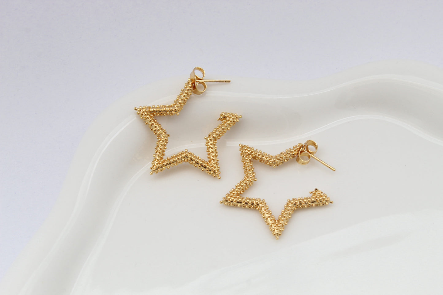 Aretes estrella